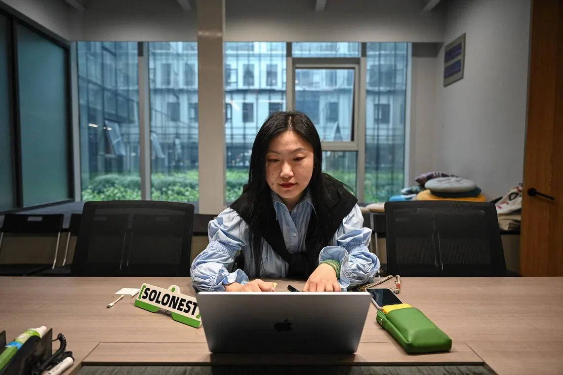 Young Chinese use AI to launch one-person firms over job anxiety | The  Straits Times