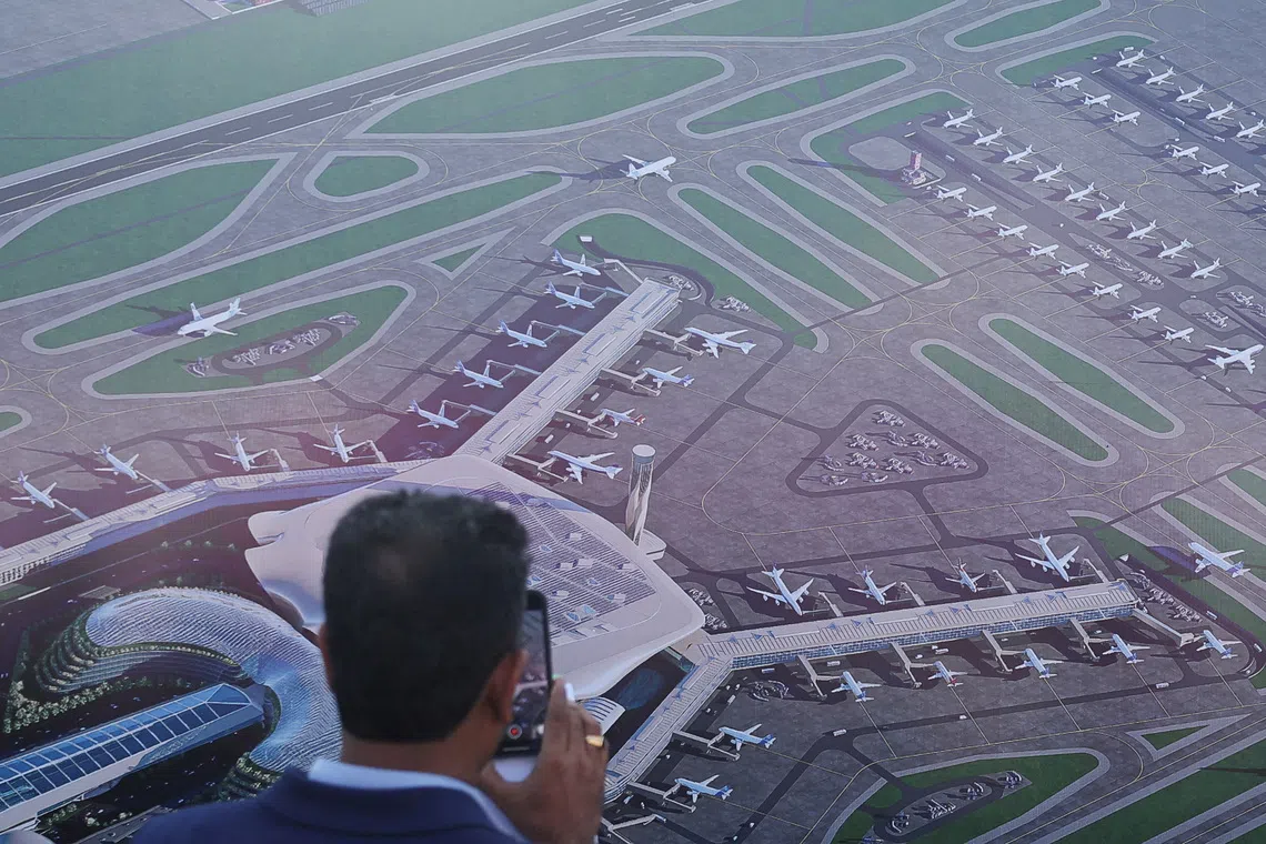 The plan involves adding terminals, taxiways and a runway at the Navi Mumbai airport, which is set to open on Dec 25, sources said.