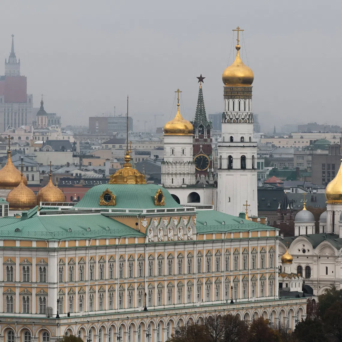A view of the Kremlin's Spasskaya Tower, the Ivan the Great Bell tower and the Grand Kremlin Palace from the dome of the Christ the Saviour Cathedral in Moscow, Russia October 20, 2025. REUTERS/Shamil Zhumatov