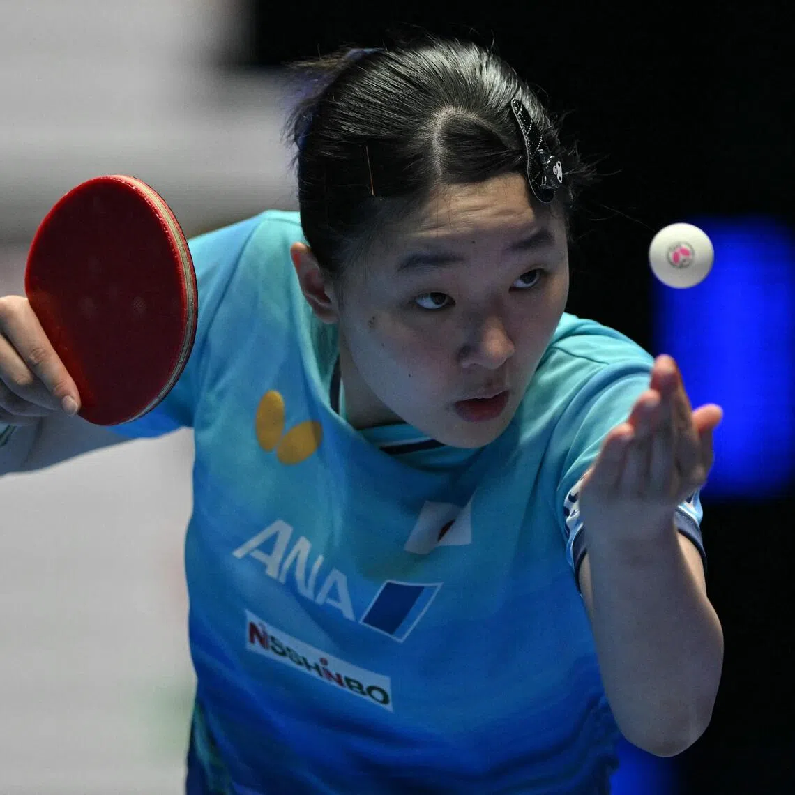 Japan’s Miwa Harimoto serves against China’s Wang Manyu during their Women’s Teams final match at the ITTF World Table Tennis Championships in Wembley Arena on May 10.
