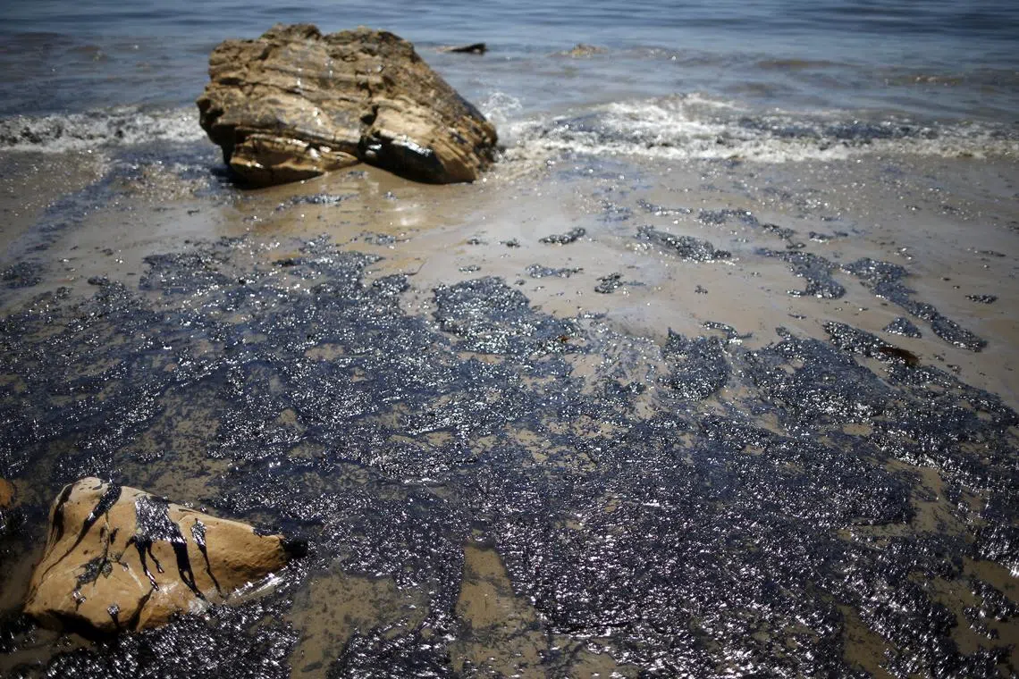 FILE PHOTO: An oil slick is seen along the coast of Refugio State Beach in Goleta, California, United States, May 20, 2015. 