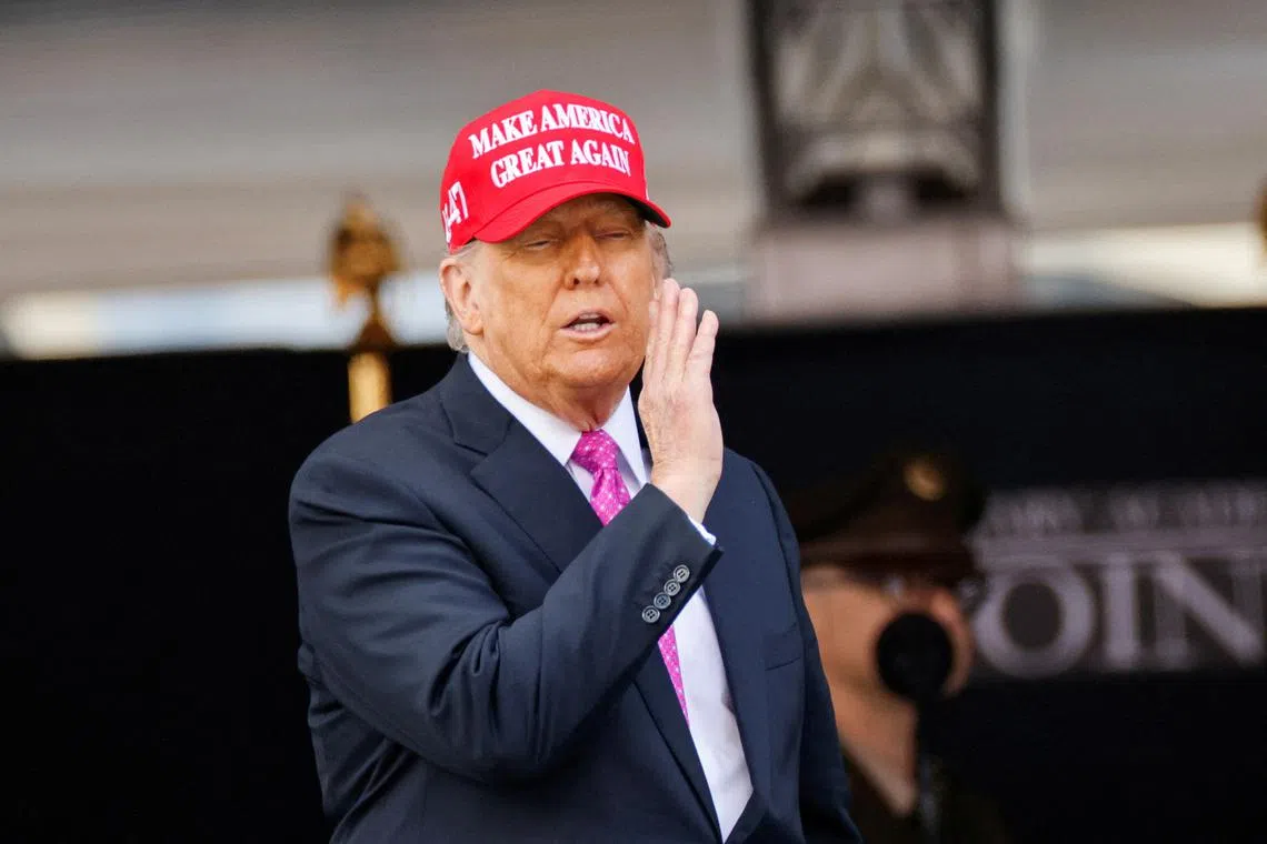 FILE PHOTO: U.S. President Donald Trump wears a 'Make America Great Again' (MAGA) hat as he attends the commencement ceremony at West Point Military Academy in West Point, New York, U.S., May 24, 2025. REUTERS/Eduardo Munoz/File Photo