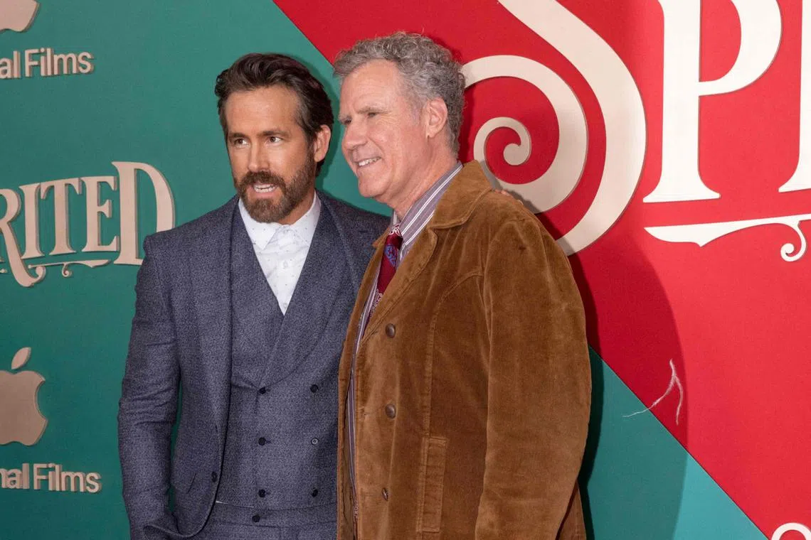 Ryan Reynolds (left) and Will Ferrell at the New York premiere of Spirited on Nov 7, 2022.