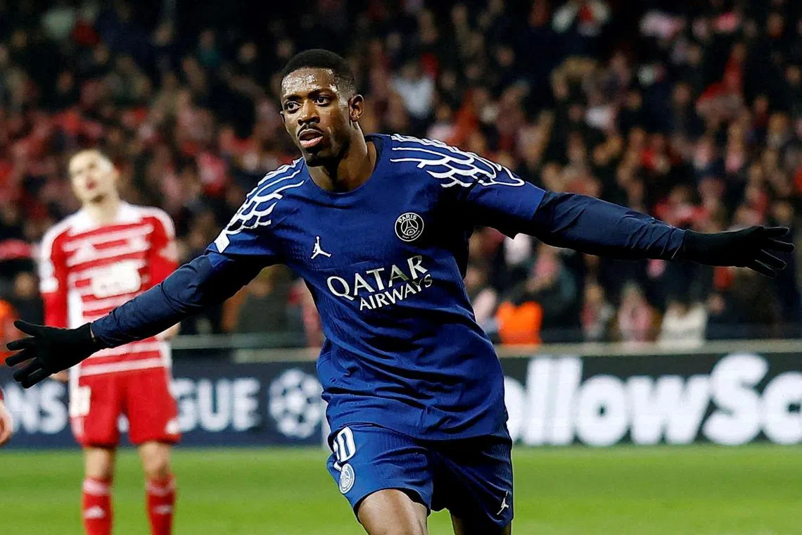 Paris Saint-Germain's Ousmane Dembele celebrates after scoring against Brest in their 3-0 Champions League win.