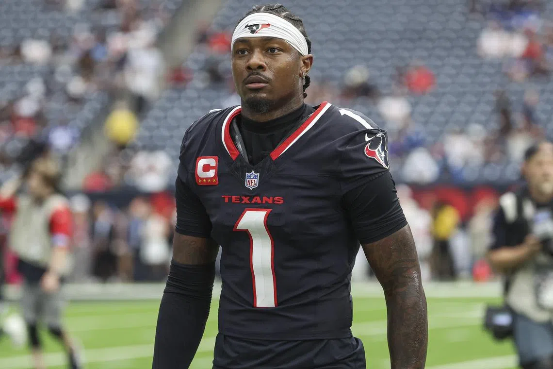 FILE PHOTO: Oct 27, 2024; Houston, Texas, USA; Houston Texans wide receiver Stefon Diggs (1) walks towards the sideline before the game against the Indianapolis Colts at NRG Stadium. Mandatory Credit: Troy Taormina-Imagn Images/File Photo