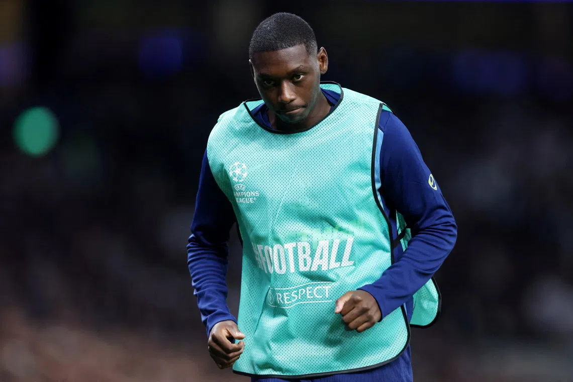 FILE PHOTO: Soccer Football - UEFA Champions League - Tottenham Hotspur v Villarreal - Tottenham Hotspur Stadium, London, Britain - September 16, 2025 Tottenham Hotspur's Kolo Muani warming up on the sideline during the match REUTERS/David Klein/File Photo