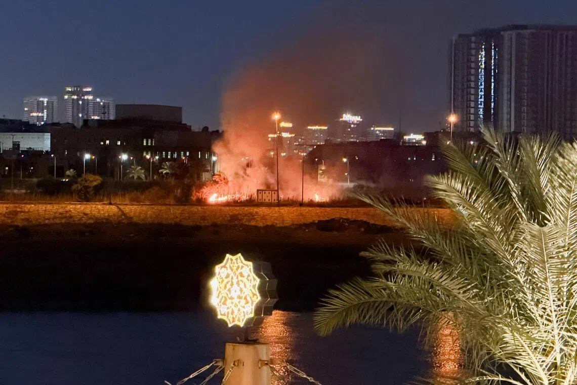 Smoke rising after an explosion at the US Embassy compound in Baghdad, Iraq, on March 17.