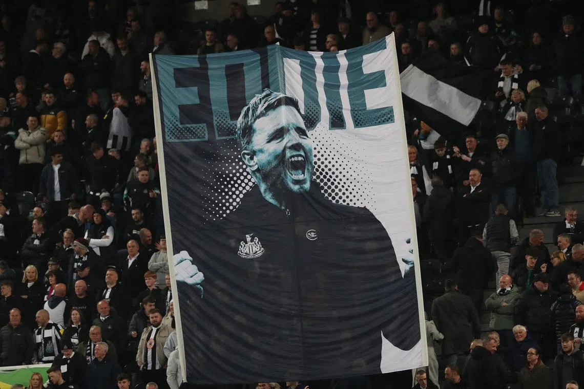 Soccer Football - Premier League - Newcastle United v Crystal Palace - St James' Park, Newcastle, Britain - April 16, 2025 Newcastle United fans with a banner of Newcastle United manager Eddie Howe before the match Action Images via Reuters/Scott Heppell EDITORIAL USE ONLY. NO USE WITH UNAUTHORIZED AUDIO, VIDEO, DATA, FIXTURE LISTS, CLUB/LEAGUE LOGOS OR 'LIVE' SERVICES. ONLINE IN-MATCH USE LIMITED TO 120 IMAGES, NO VIDEO EMULATION. NO USE IN BETTING, GAMES OR SINGLE CLUB/LEAGUE/PLAYER PUBLICATIONS. PLEASE CONTACT YOUR ACCOUNT REPRESENTATIVE FOR FURTHER DETAILS..