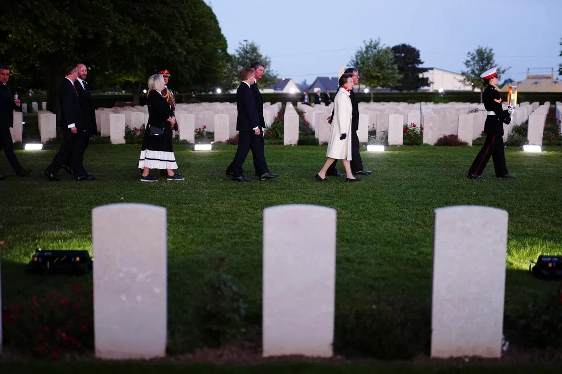 Britain's Anne, The Princess Royal, President of the Commonwealth War Graves Commission walks past headstones she arrives for the Commonwealth War Grave Commission's Great Vigil to mark the 80th anniversary of D-Day, at the Bayeux War Cemetery in Normandy, France.  June 5, 2024. Aaron Chown/Pool via REUTERS