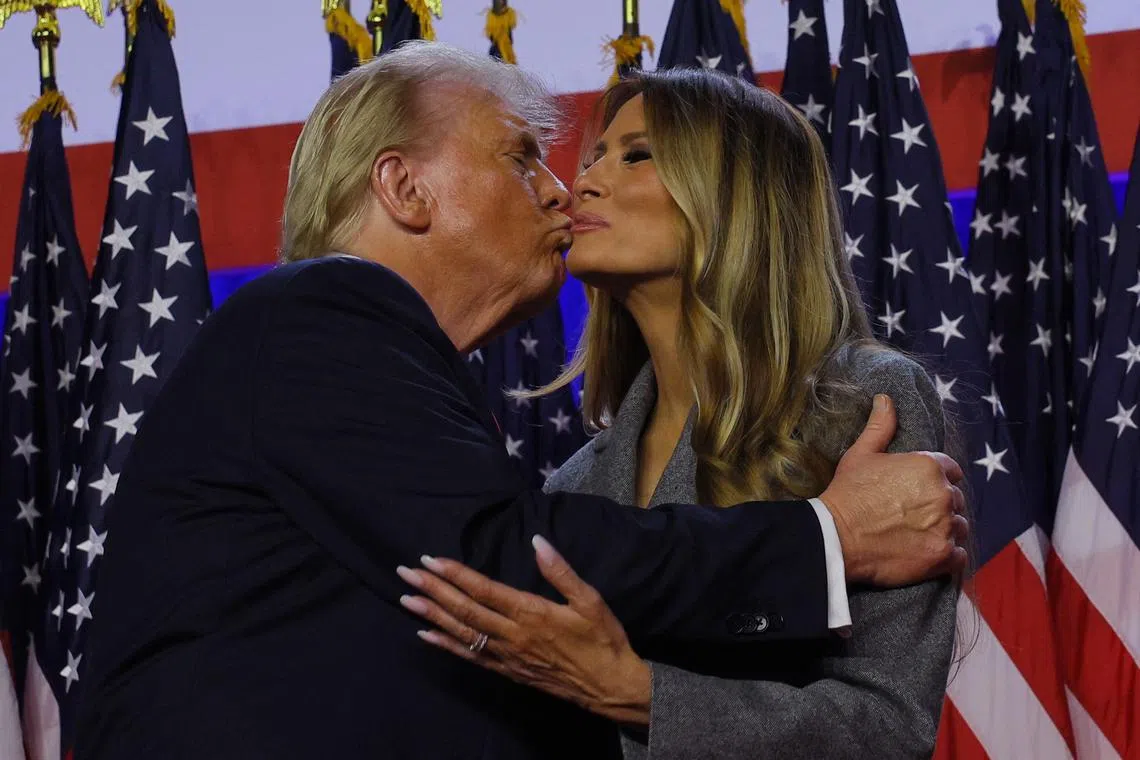 Republican presidential nominee and former US President Donald Trump kissing his wife Melania at his rally, at the Palm Beach County Convention Centre in West Palm Beach, Florida, US, Nov 6, 2024. 
