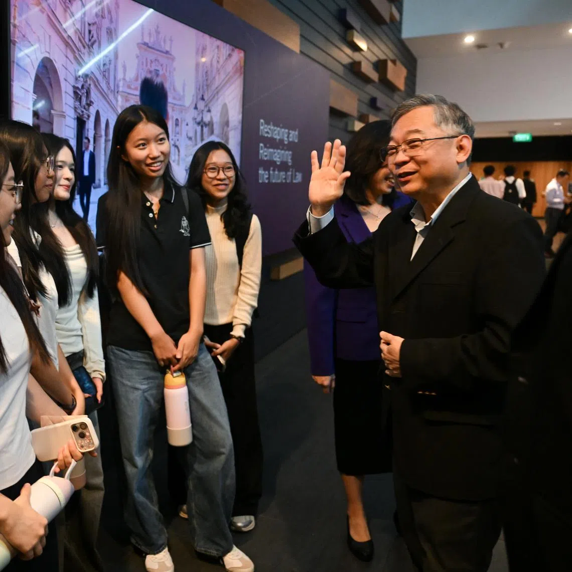 Deputy Prime Minister Gan Kim Yong speaking with students at the Financial Industry Fiesta 2026 at SMU on May 19.