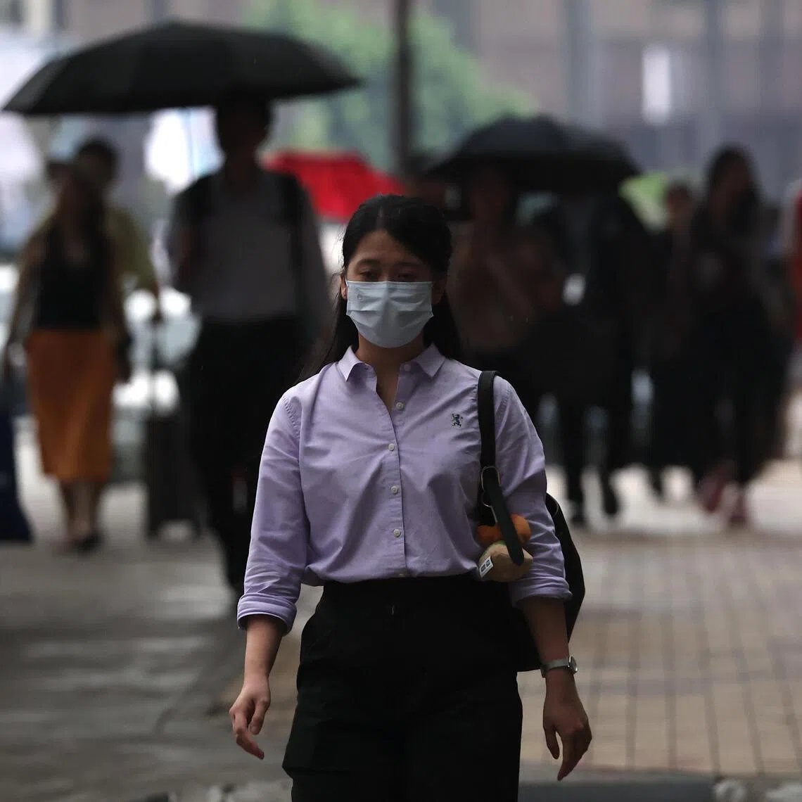 Some Malaysians are stocking up on face masks and limiting outdoor activities amid concerns that conditions could worsen in the coming weeks.