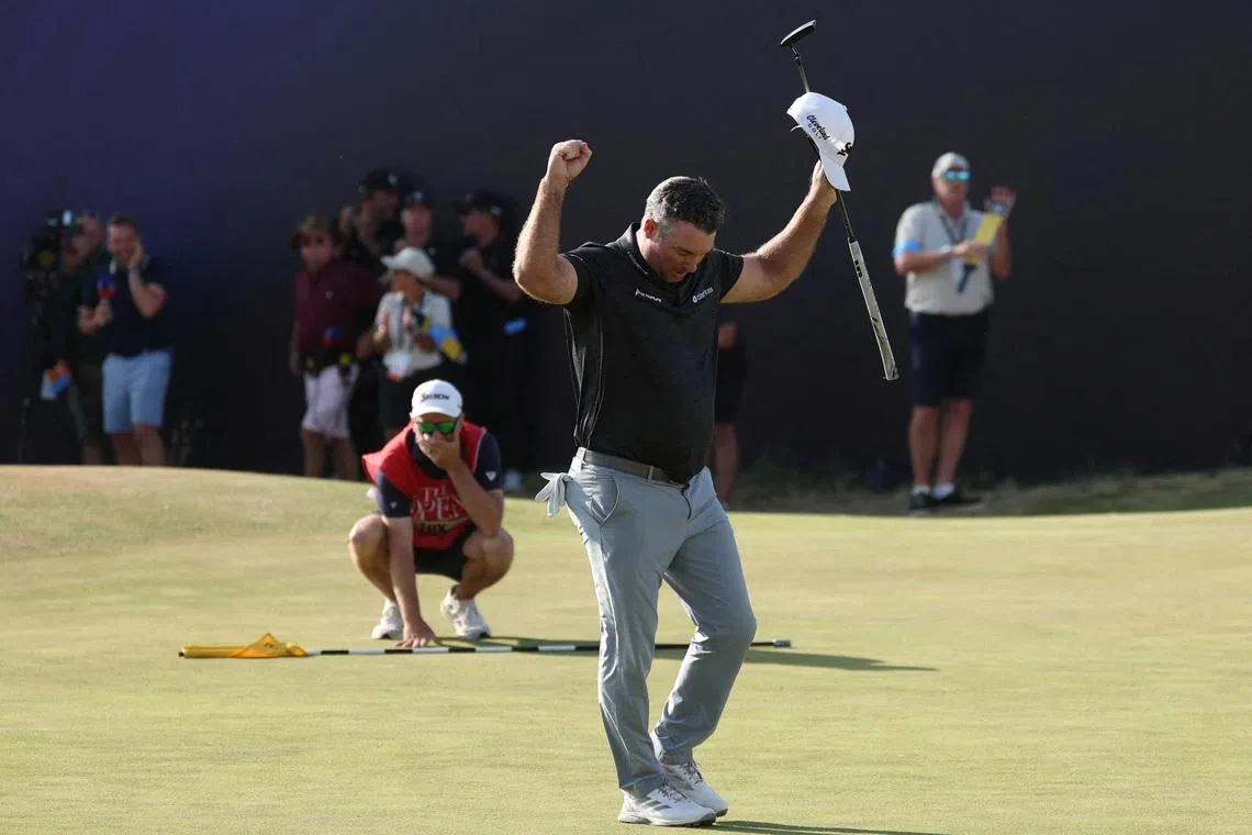 Golf - The 154th Open Championship - Royal Birkdale Golf Club, Southport, Britain - July 19, 2026 New Zealand's Ryan Fox celebrates after he holes his putt on the 18th green to win The 154th Open REUTERS/Andrew Boyers