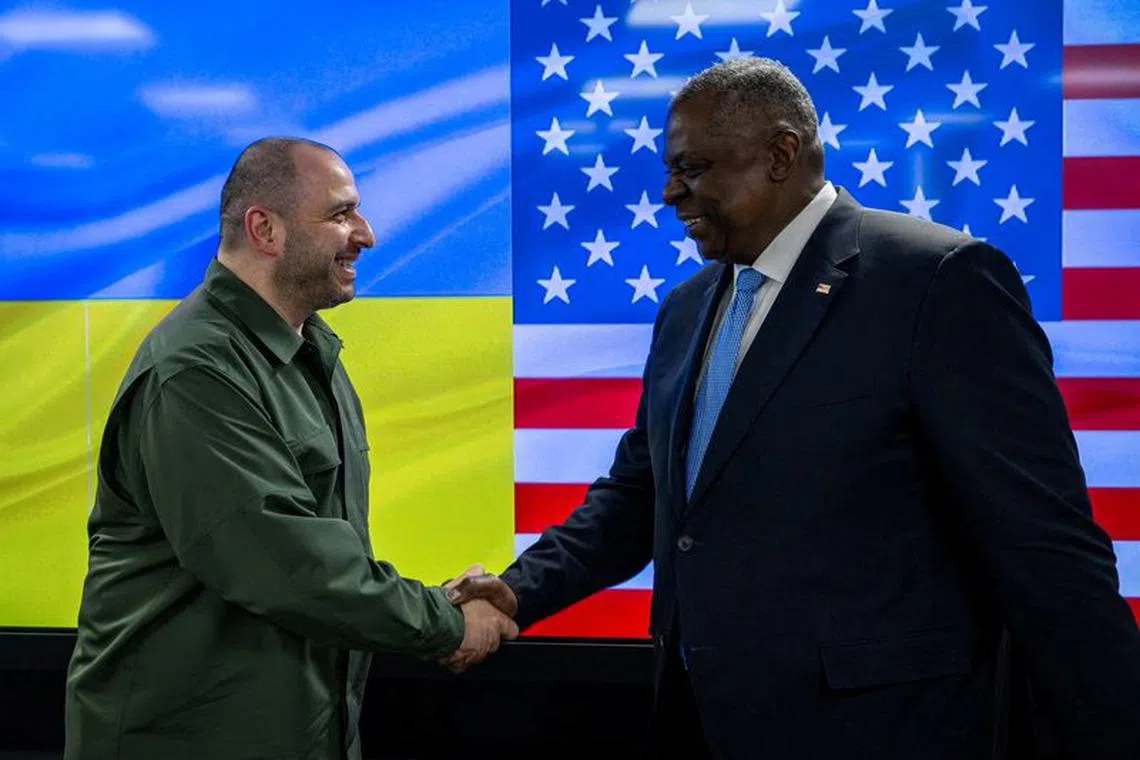 FILE PHOTO: U.S. Defense Secretary Lloyd Austin and Ukraine's Defence Minister Rustem Umerov shake hands after their meeting, amid Russia's attack on Ukraine, in Kyiv, Ukraine November 20, 2023. Ukraine's Defence Minister Rustem Umerov via X/Handout via 