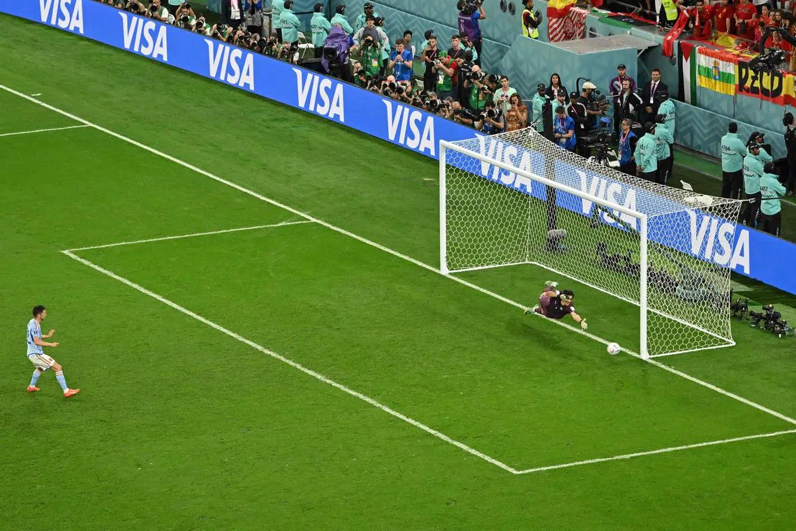 Spain midfielder Pablo Sarabia, who comes on as a substitute in the 118th minute of extra time, misses his penalty kick against Morocco, with his side exiting the 2022 World Cup in the Round of 16.
