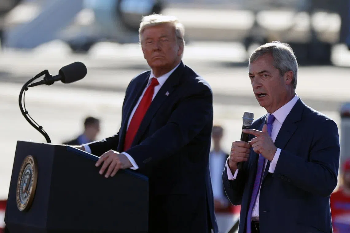 FILE PHOTO: Nigel Farage speaks next to U.S. President Donald Trump during a campaign rally at Phoenix Goodyear Airport in Goodyear, Arizona, U.S., October 28, 2020. REUTERS/Jonathan Ernst/File Photo