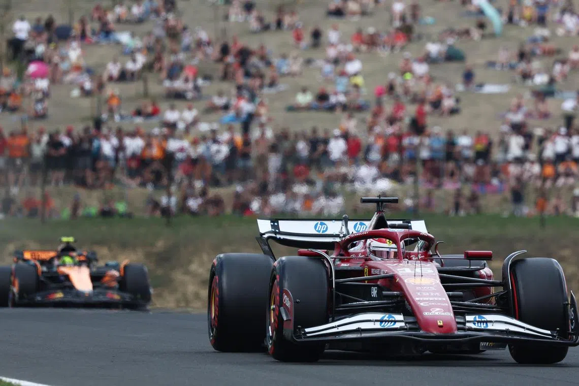 Ferrari's Charles Leclerc and McLaren's Lando Norris during qualifying for the Hungarian Grand Prix.