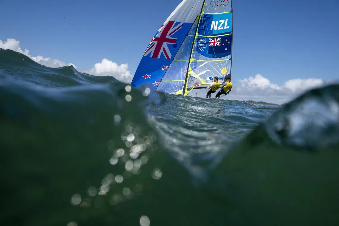 Tokyo 2020 Olympics - Sailing - Men's 49er - Medal Race - Enoshima Yacht Harbour - Tokyo, Japan - August 3, 2021. Peter Burling of New Zealand and Blair Tuke of New Zealand in action. REUTERS/Carlos Barria