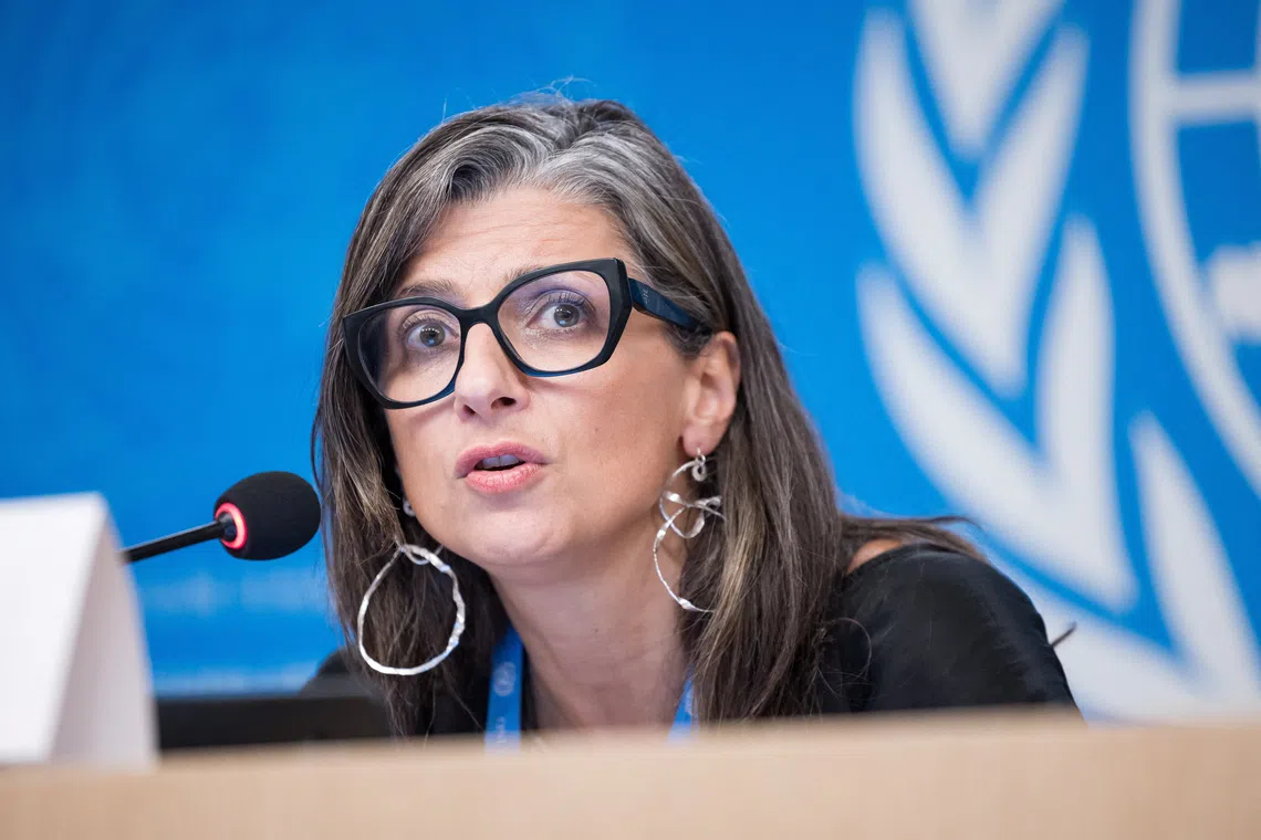 FILE PHOTO: United Nations Special Rapporteur on the situation of human rights in the occupied Palestinian territory, Francesca Albanese, speaks during a press conference at the European headquarters of the UN in Geneva, Switzerland, September 15, 2025. REUTERS/Pierre Albouy/File Photo