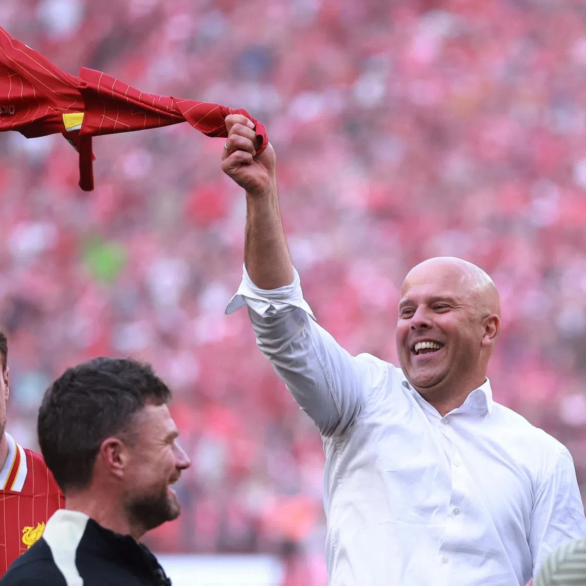 Soccer Football - Premier League - Liverpool v Tottenham Hotspur - Anfield, Liverpool, Britain - April 27, 2025 Liverpool manager Arne Slot celebrates after winning the Premier League REUTERS/Phil Noble