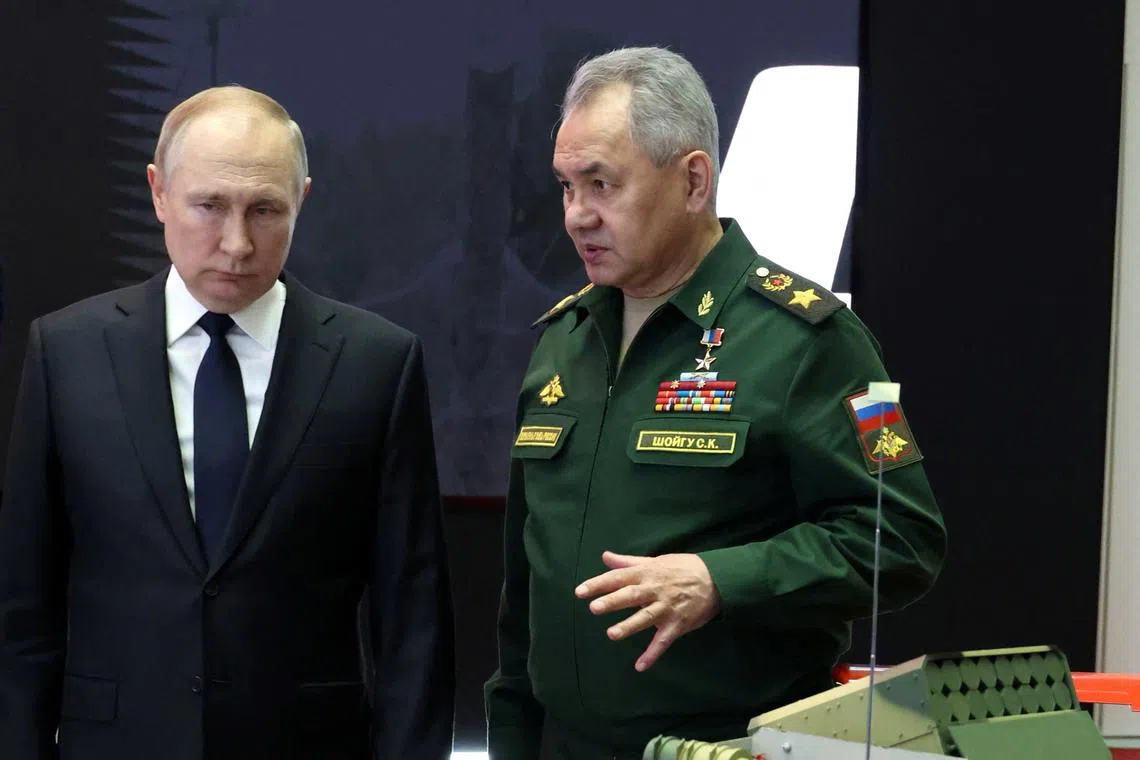 Russian President Vladimir Putin and Defence Minister Sergei Shoigu at a military equipment exhibition in Moscow last month.