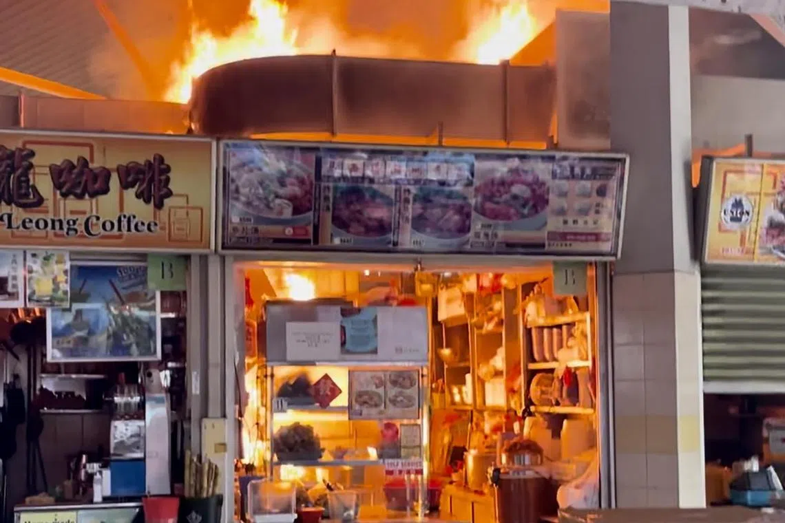 A preliminary investigation showed the fire had originated from the stove area in one of the affected stalls, said the SCDF.
