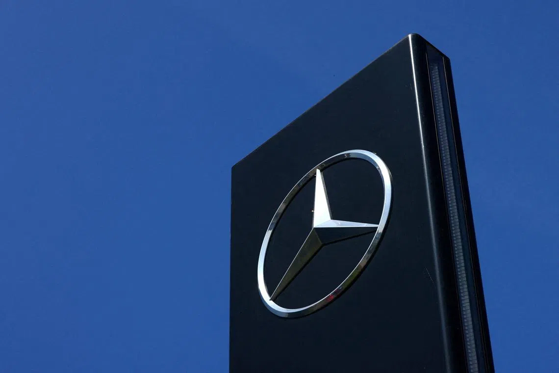 FILE PHOTO: The logo of Mercedes-Benz is seen outside a Mercedes-Benz car dealer in Brussels, Belgium June 1, 2023. REUTERS/Yves Herman/File Photo