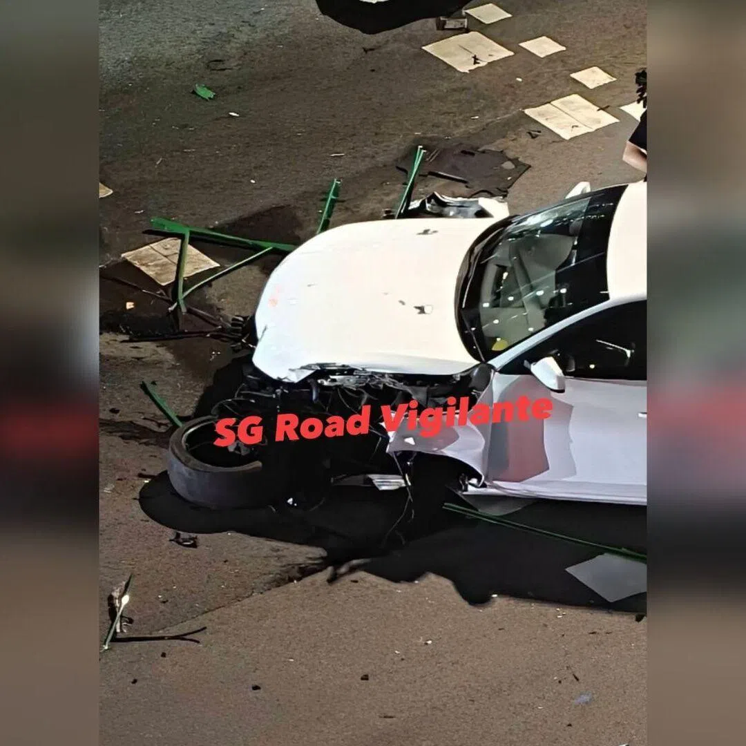 Photos of the incident shows a white car that appears to have crashed into the railing in the middle of the road.