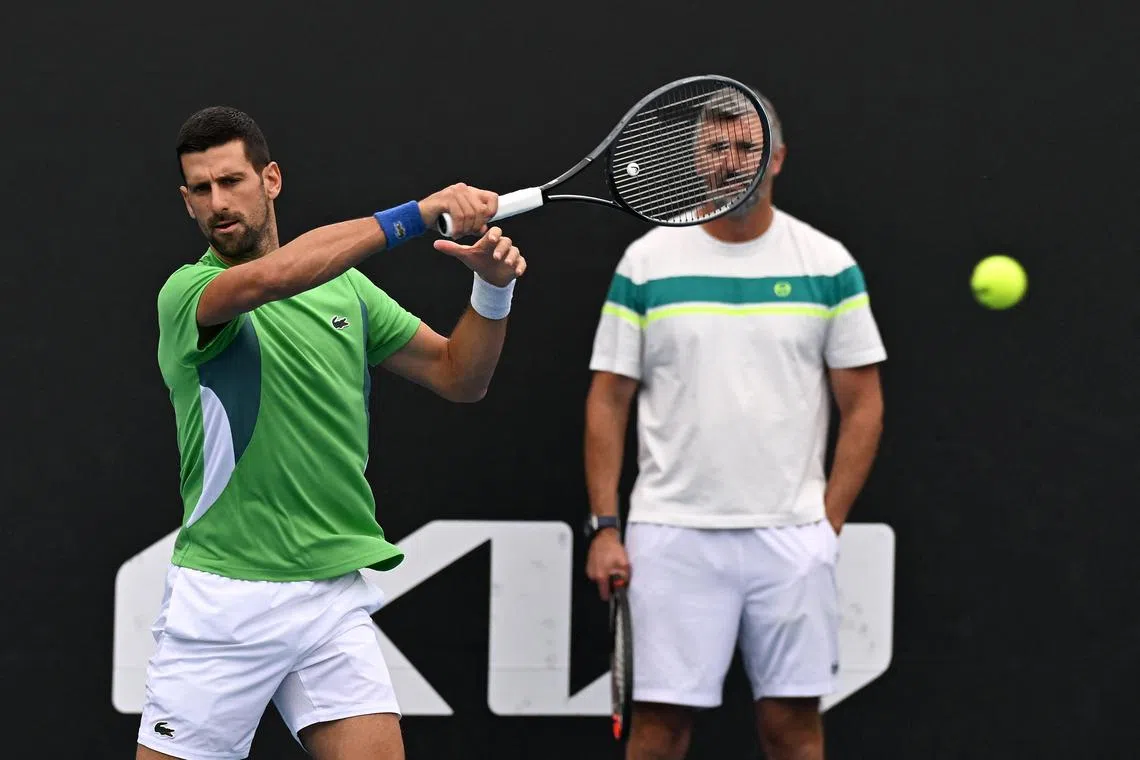 Serbia's Novak Djokovic at a training session next to his coach Goran Ivanisevic ahead of the Australian Open semi-finals.