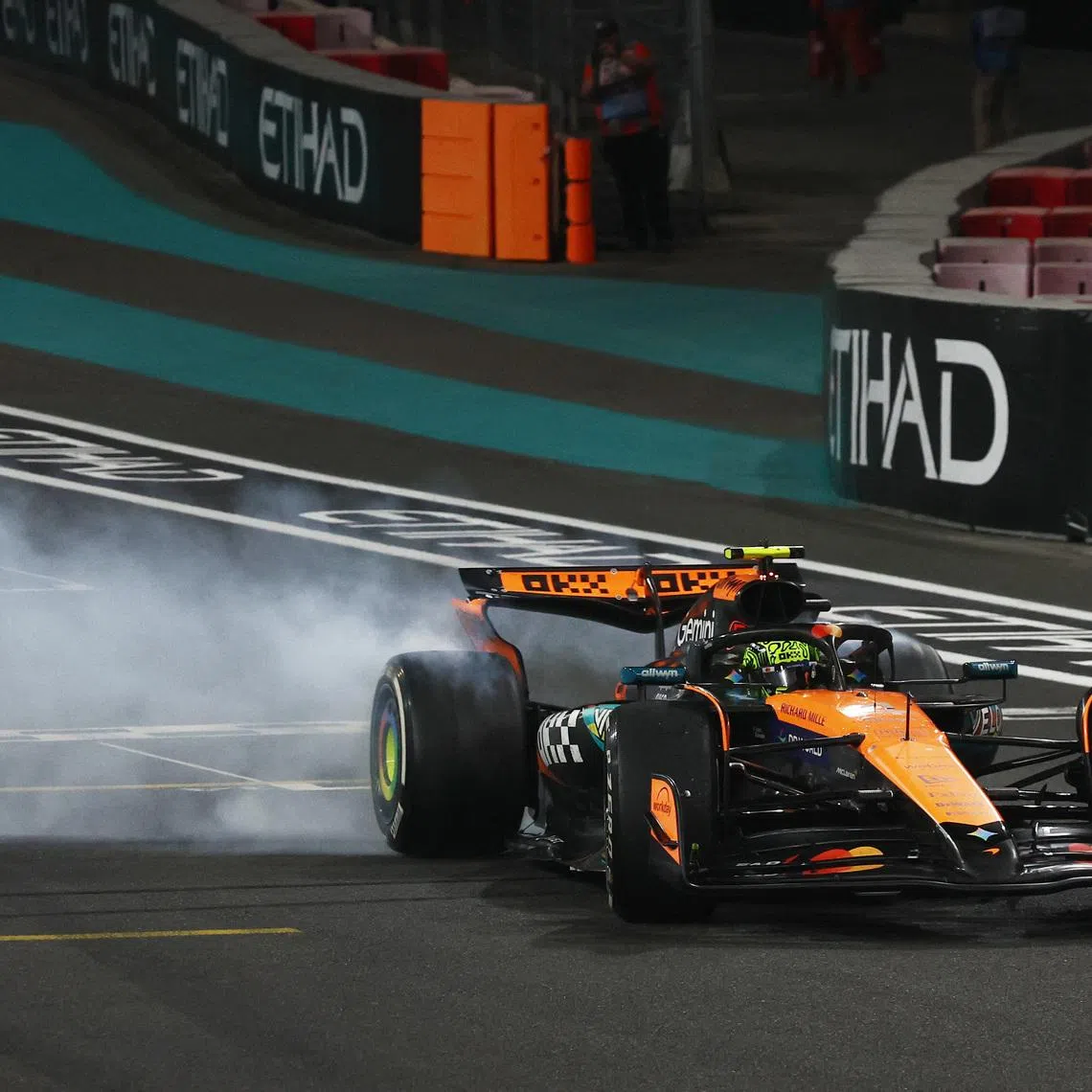 Formula One F1 - Abu Dhabi Grand Prix - Yas Marina Circuit, Abu Dhabi, United Arab Emirates - December 7, 2025 McLaren's Lando Norris celebrates after becoming the 2025 Formula One World Champion REUTERS/Jakub Porzycki