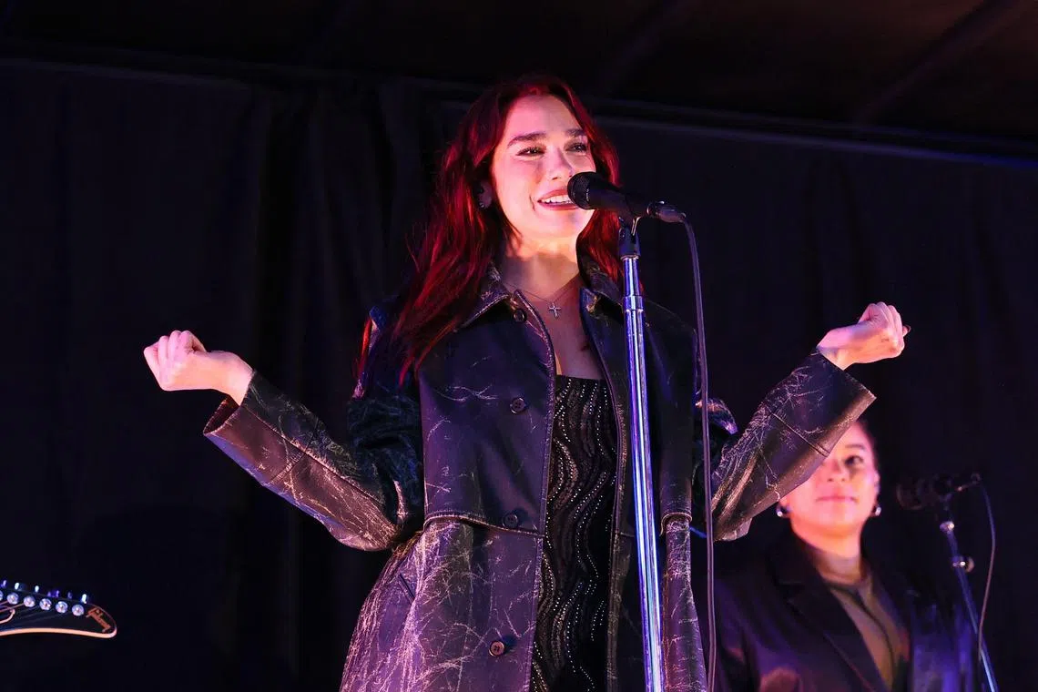 NEW YORK, NEW YORK - MAY 05: Dua Lipa Performs in Times Square At Surprise Pop-Up For Her New Album on May 05, 2024 in New York City.   Theo Wargo/Getty Images/AFP (Photo by Theo Wargo / GETTY IMAGES NORTH AMERICA / Getty Images via AFP)