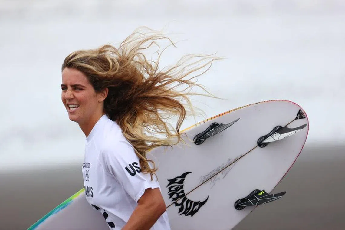 FILE PHOTO: Tokyo 2020 Olympics - Surfing - Women's Shortboard - Quarterfinals - Tsurigasaki Surfing Beach, Tokyo, Japan - July 27, 2021. Caroline Marks of the United States before competing in Heat 2 REUTERS/Lisi Niesner/File Photo