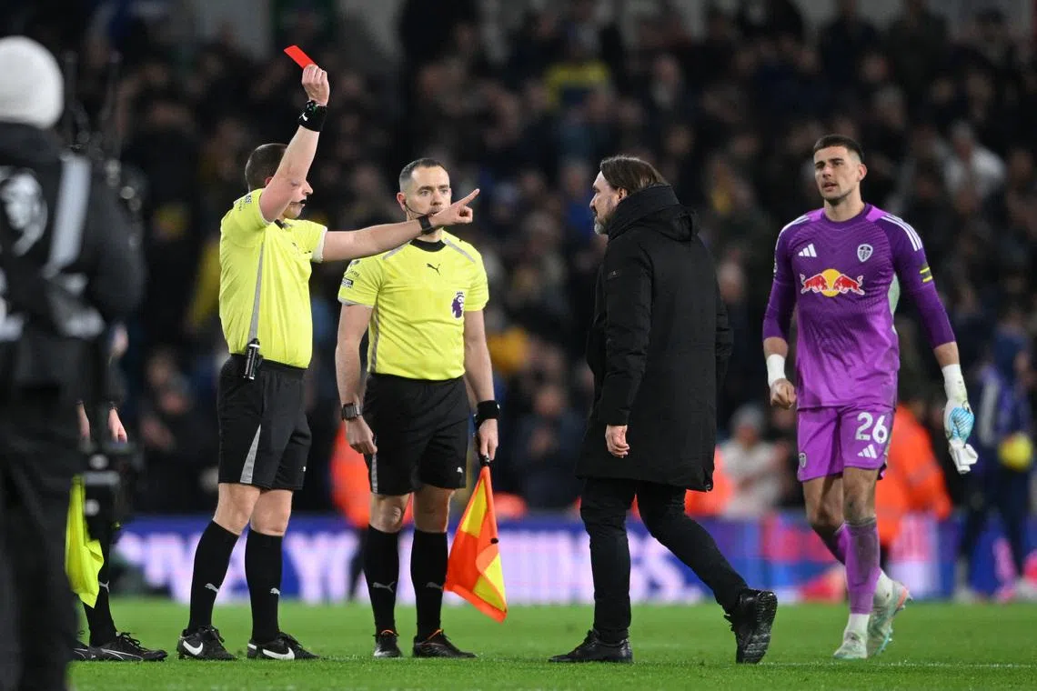 Soccer Football - Premier League - Leeds United v Manchester City - Elland Road, Leeds, Britain - February 28, 2026 Leeds United manager Daniel Farke is shown a red card by referee Peter Bankes at the end of the match REUTERS/Jaimi Joy