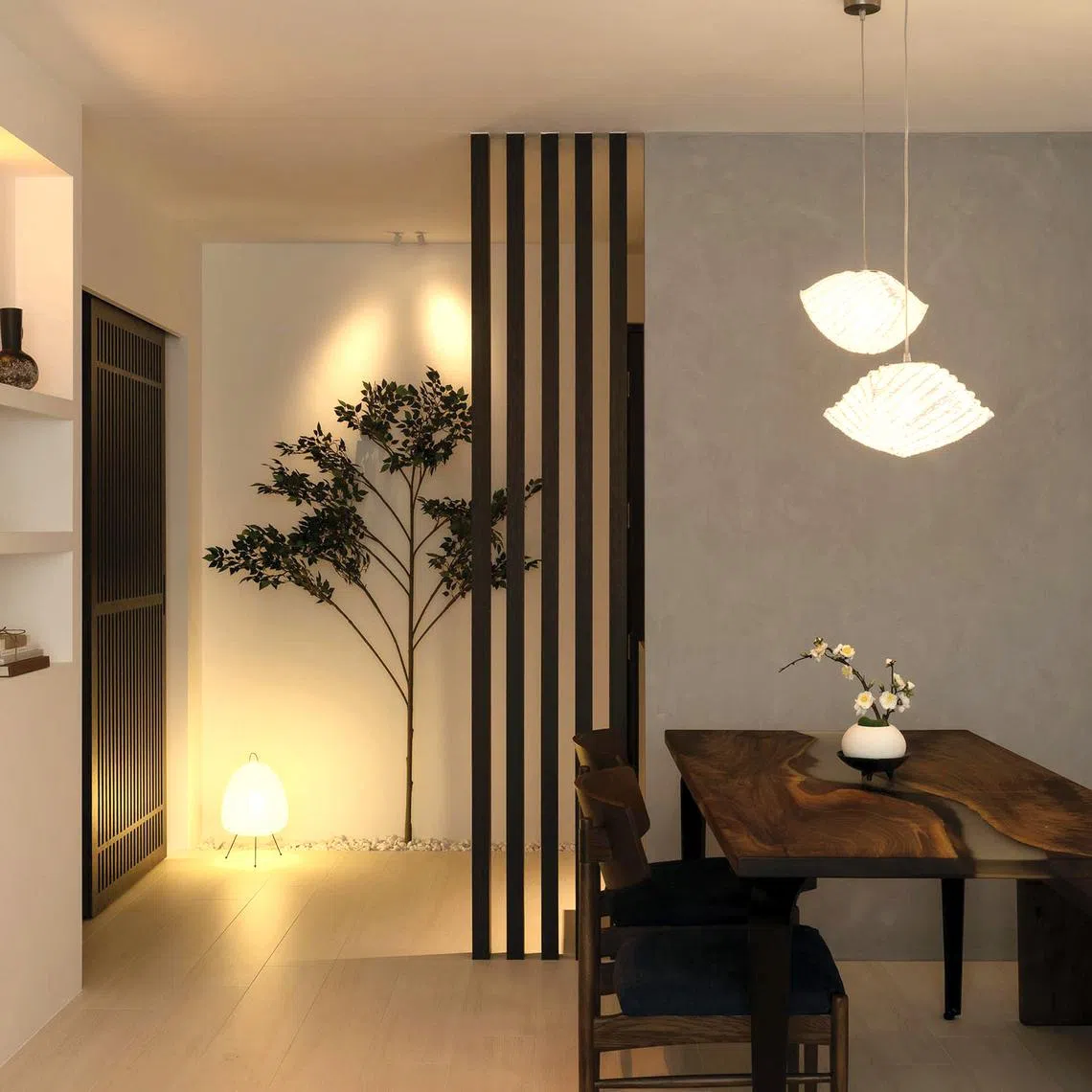 Software engineer Andi wanted a dark Japandi look for his HDB flat, which he shares with a pet cat.