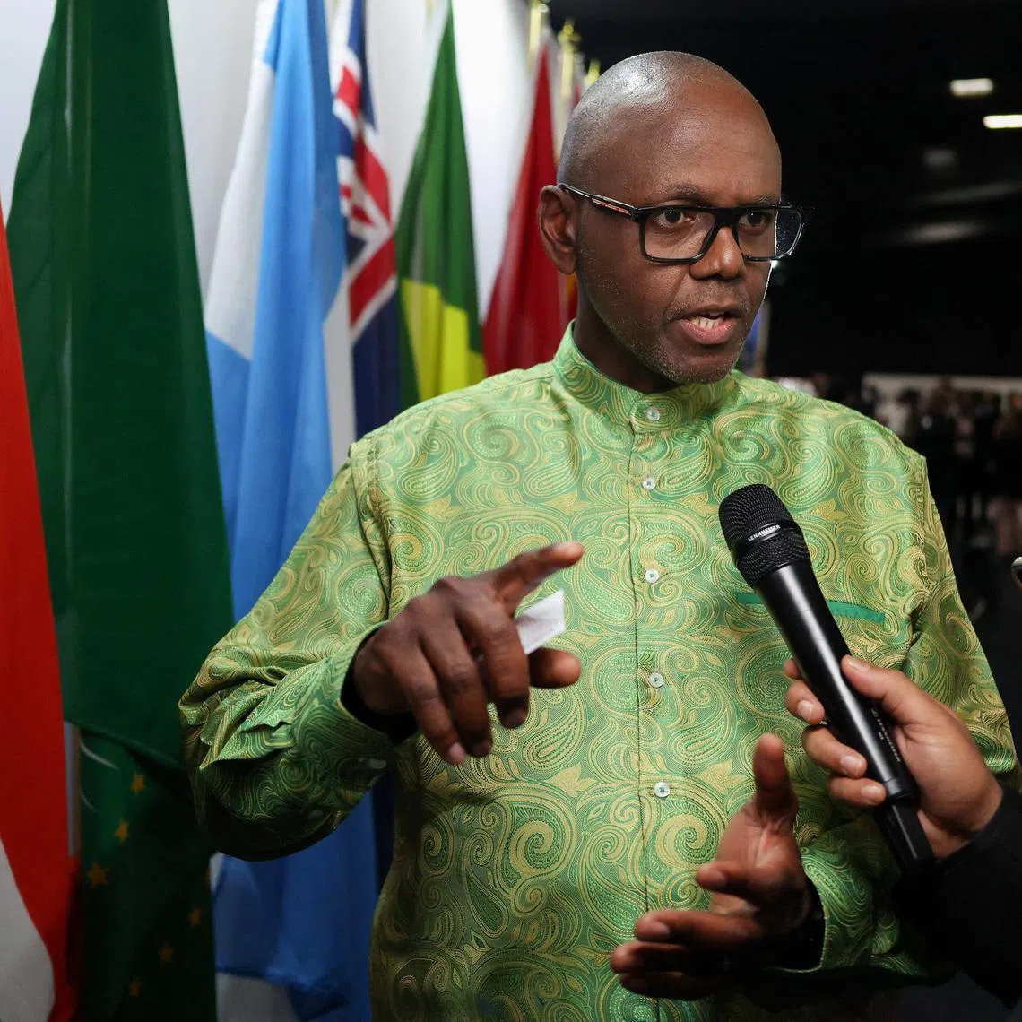 Vincent Magwenya, Spokesperson to South African President Cyril Ramaphosa answers questions from journalists on the sidelines, on the opening day of the G20 Leaders' Summit at the Nasrec Expo Center in Johannesburg, South Africa, November 22, 2025. REUTERS/Siphiwe Sibeko/File Photo