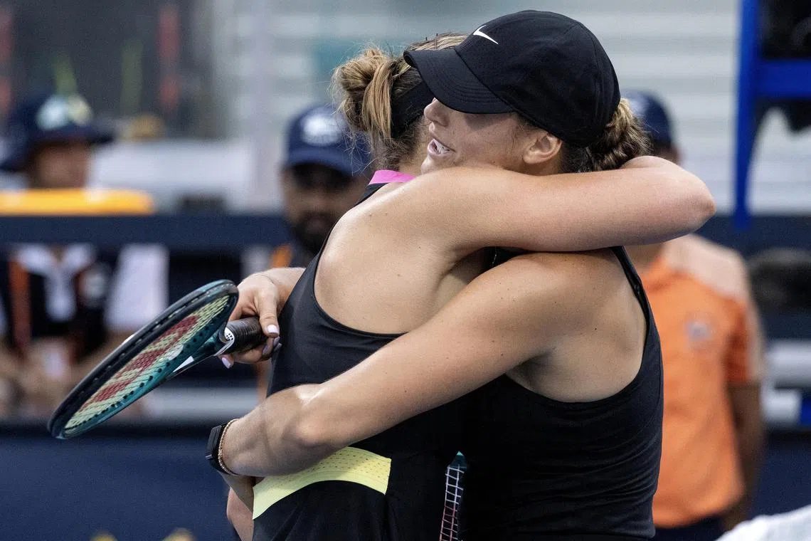 Paula Badosa hugs Aryna Sabalenka after their Miami Open second-round match.