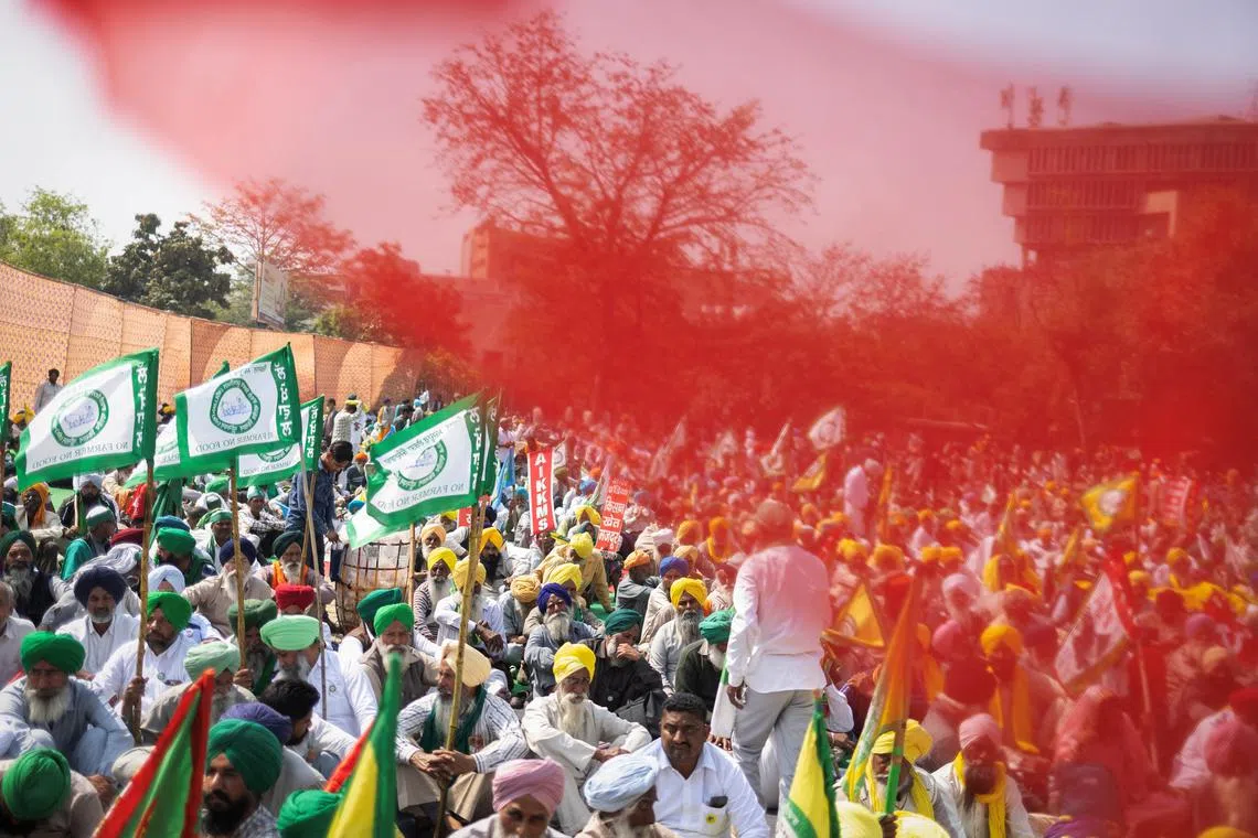 Thousands of farmers rally in New Delhi to demand higher crop prices ...