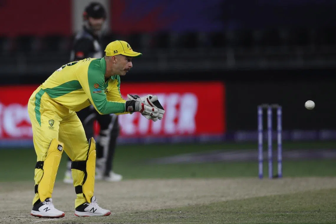 FILE PHOTO: Cricket - ICC Men's T20 World Cup Final - New Zealand v Australia- Dubai International Cricket Stadium, Dubai, United Arab Emirates - November 14, 2021 Australia's Matthew Wade in action REUTERS/Hamad I Mohammed/File Photo