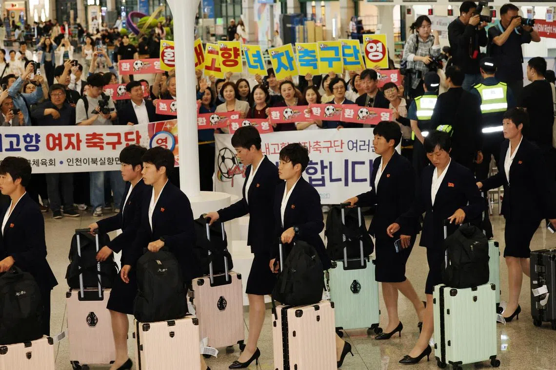 North Korea's Naegohyang Women’s FC were greeted by cheers from activists when they arrived in South Korea on May 17.