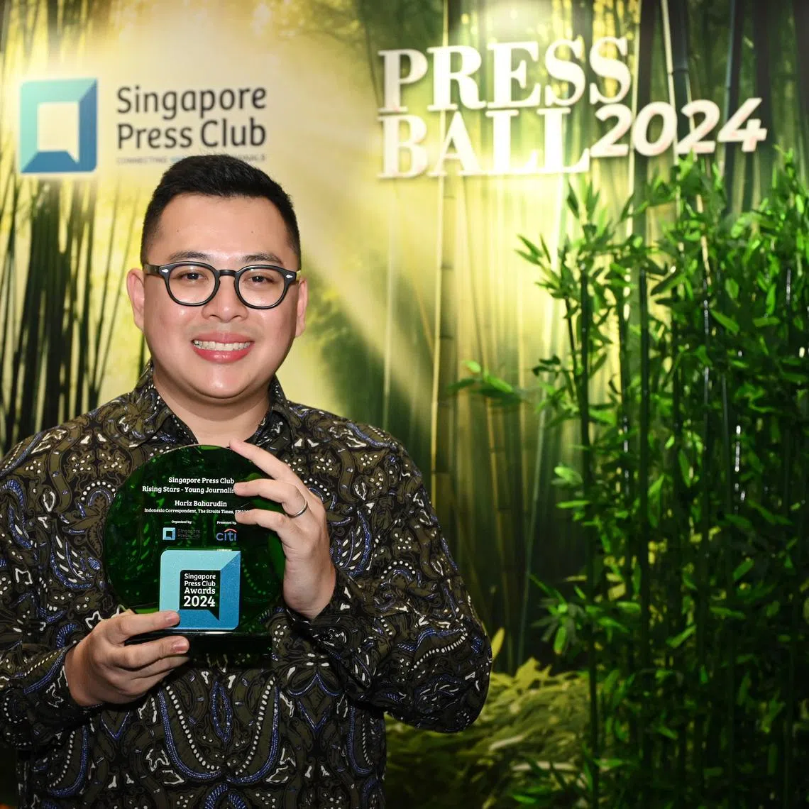 ST's Indonesia correspondent Hariz Baharudin receives the Rising Stars – Young Journalist Award at the Singapore Press Club Awards 2024 on July 13.