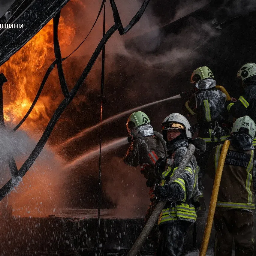 Firefighters work at the site where an energy infrastructure enterprise was hit during overnight Russian missile and drone strikes, amid Russia's attack on Ukraine, in Poltava region, Ukraine October 16, 2025. Press service of the State Emergency Service of Ukraine in Poltava region/Handout via REUTERS