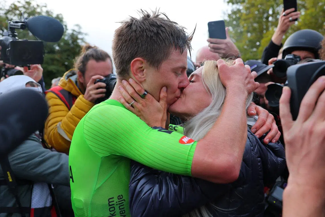 Leader Pogacar keeps ear on partner's progress in middle of Tour stage