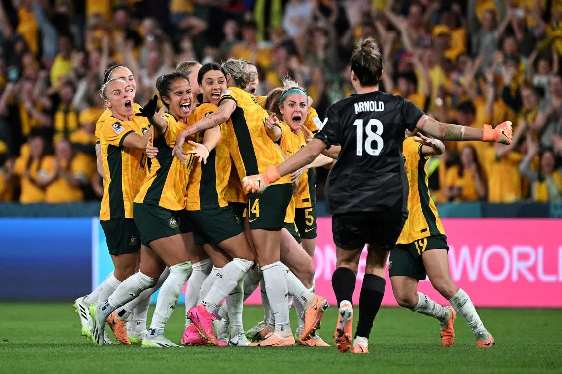 Australia's Mackenzie Arnold and her teammates celebrating their penalty shoot-out win over France in the quarter-finals of the Women's World Cup in Brisbane on Saturday.