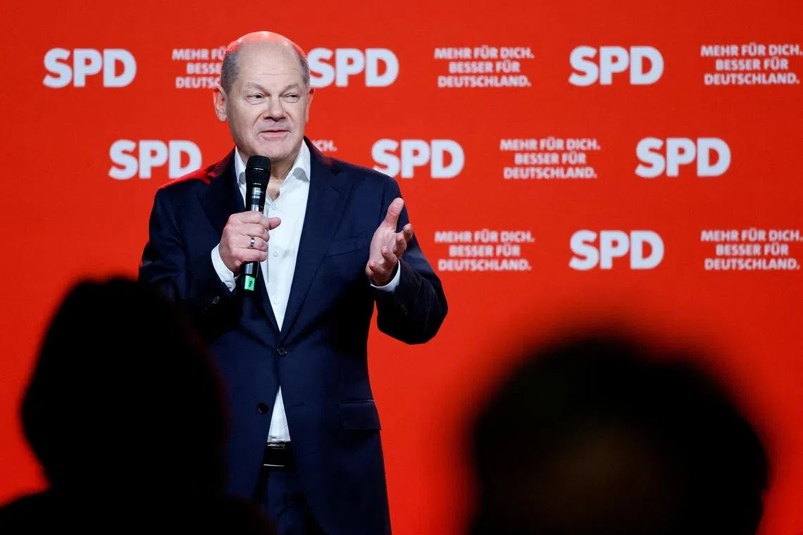 FILE PHOTO: German Chancellor Olaf Scholz of The Social Democratic party SPD speaks during his election campaign rally in Wiesbaden, Germany, January 25, 2025. REUTERS/Wolfgang Rattay/File Photo