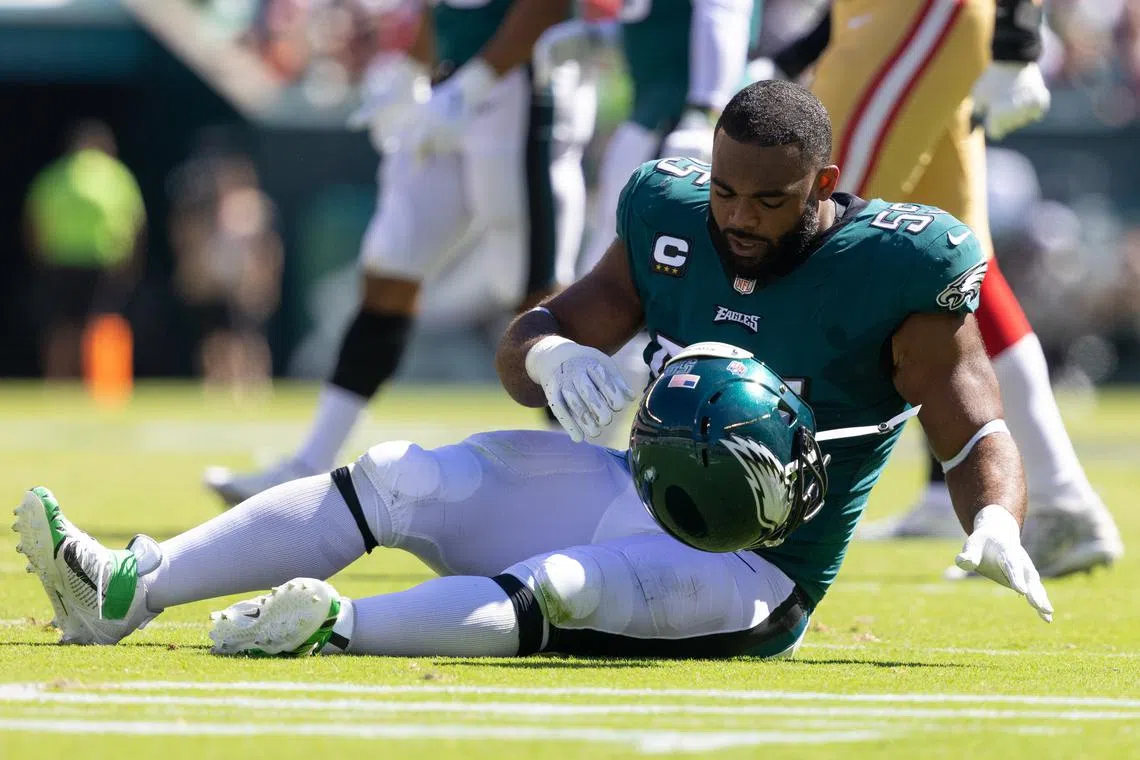 Sep 19, 2021; Philadelphia, Pennsylvania, USA; Philadelphia Eagles defensive end Brandon Graham (55) takes off his helmet after being injured during the second quarter against the San Francisco 49ers at Lincoln Financial Field. Mandatory Credit: Bill Streicher-USA TODAY Sports/File Photo