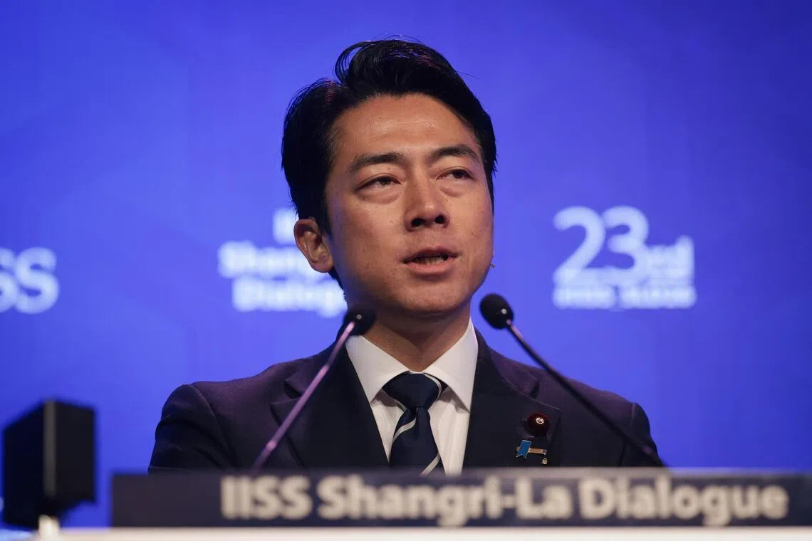 Japan says it remains open to dialogue with China, rejects ‘new militarism’ label