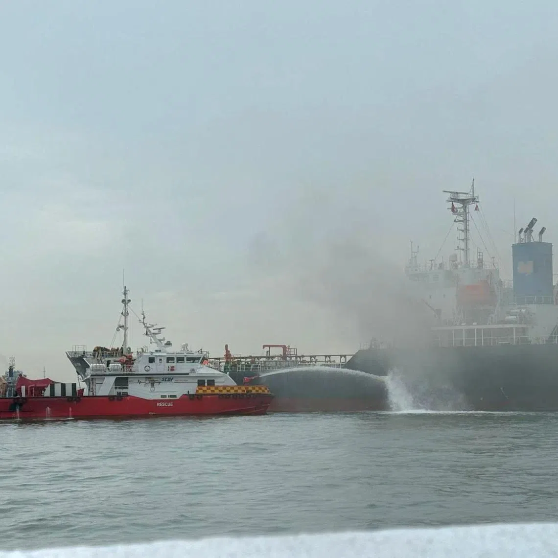 The Singapore Civil Defence Force was alerted to the fire, which broke out on an oil tanker, at 8.10am.