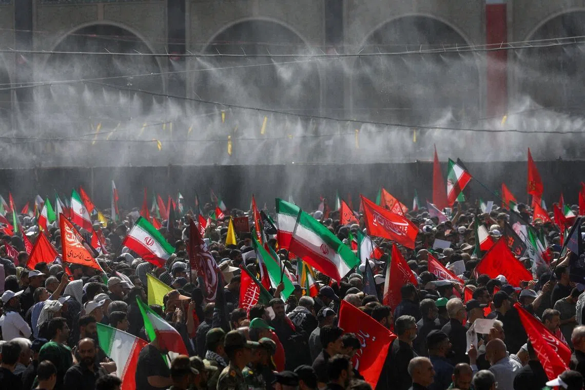 People attending a public farewell ceremony to pay their respects to Iran’s late Supreme Leader Ayatollah Ali Khamenei at the Imam Khomeini Grand Mosalla, in Tehran, on July 4.