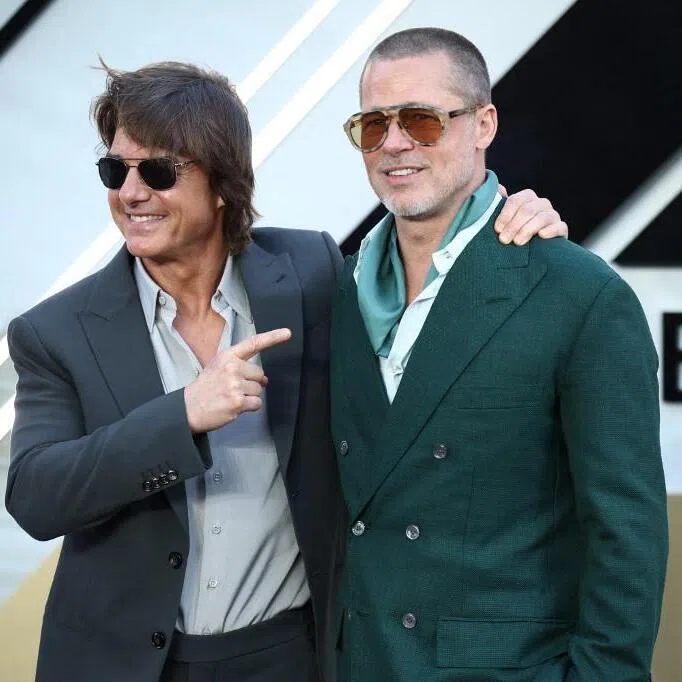 Actor-producer Brad Pitt (right) with actor Tom Cruise at the premiere of F1 The Movie in London on June 23, 2025. 