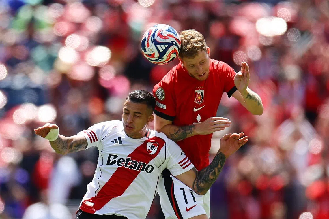 Soccer Football - FIFA Club World Cup - Group E - River Plate v Urawa Red Diamonds - Lumen Field, Seattle, Washington, U.S. - June 17, 2025 River Plate's Kevin Castano in action with Urawa Red Diamonds' Samuel Gustafsson REUTERS/Agustin Marcarian